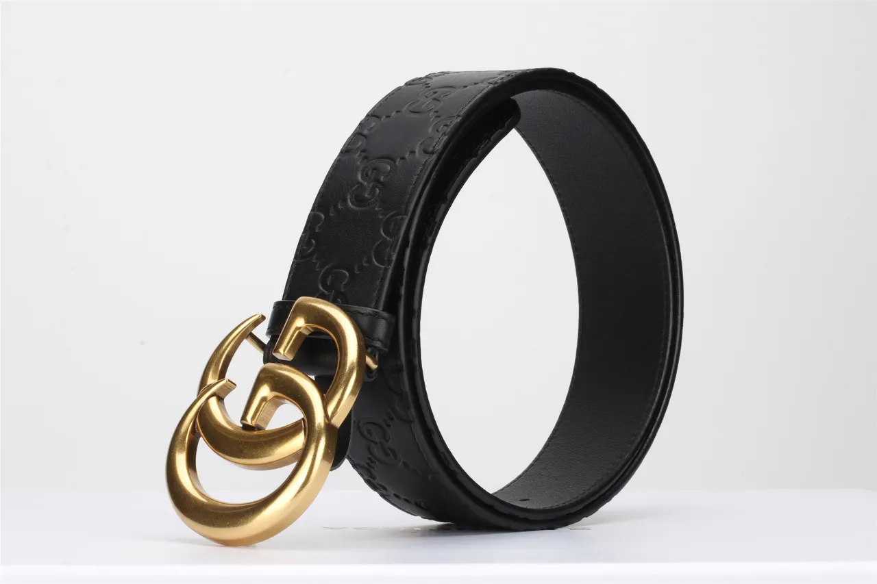 Gucci Double G cinturón negro dorado embossado GG Monogram Polished Buckle de cuero 5