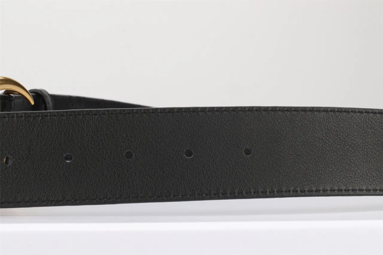 Gucci Double G cinturón negro dorado embossado GG Monogram Polished Buckle de cuero 8