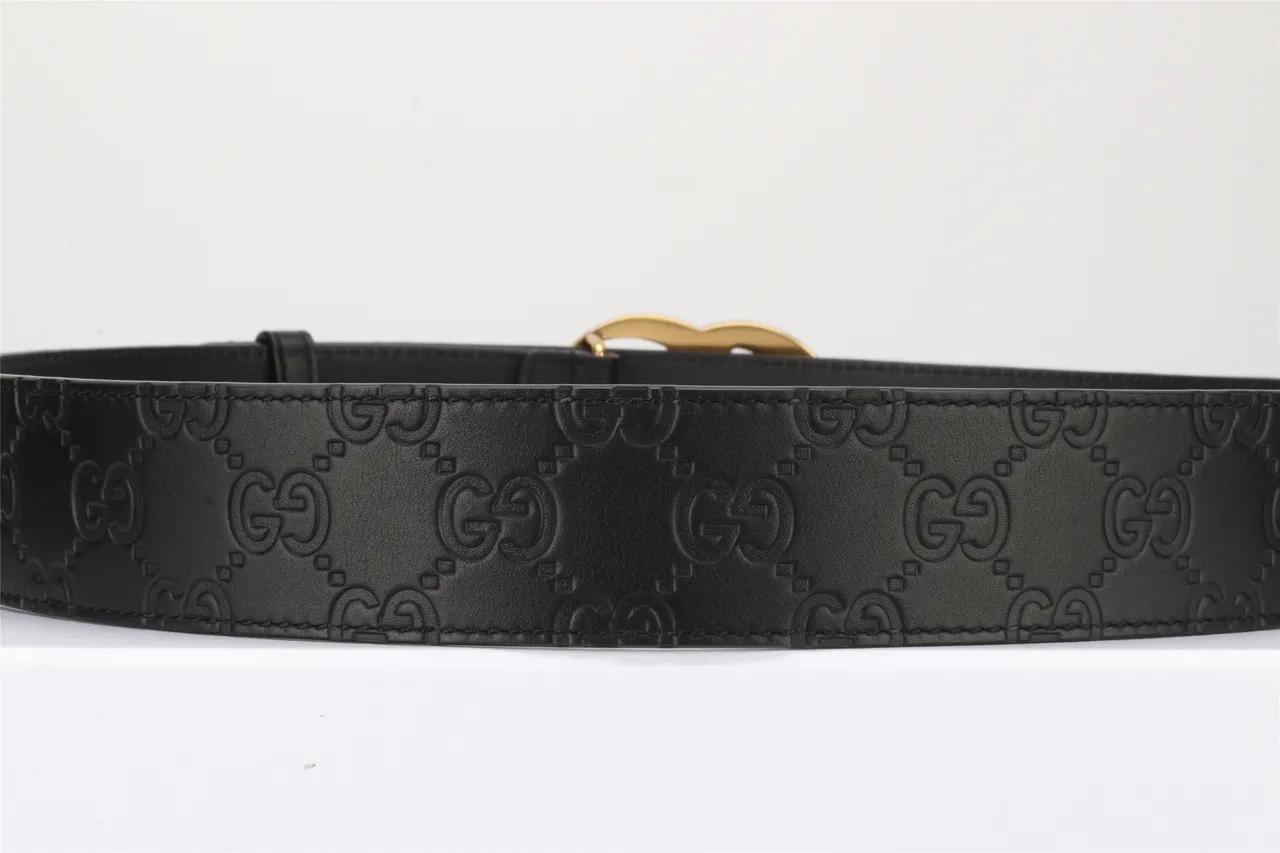 Gucci Double G cinturón negro dorado embossado GG Monogram Polished Buckle de cuero 9