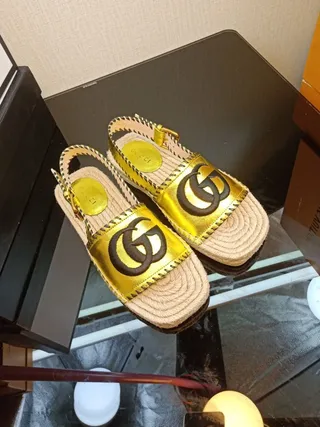 Gucci GG Marmont सुनहरा काला पट्टी जूट लिपटा एस्पाड्रिल सोल कैजुअल सैंडल 4