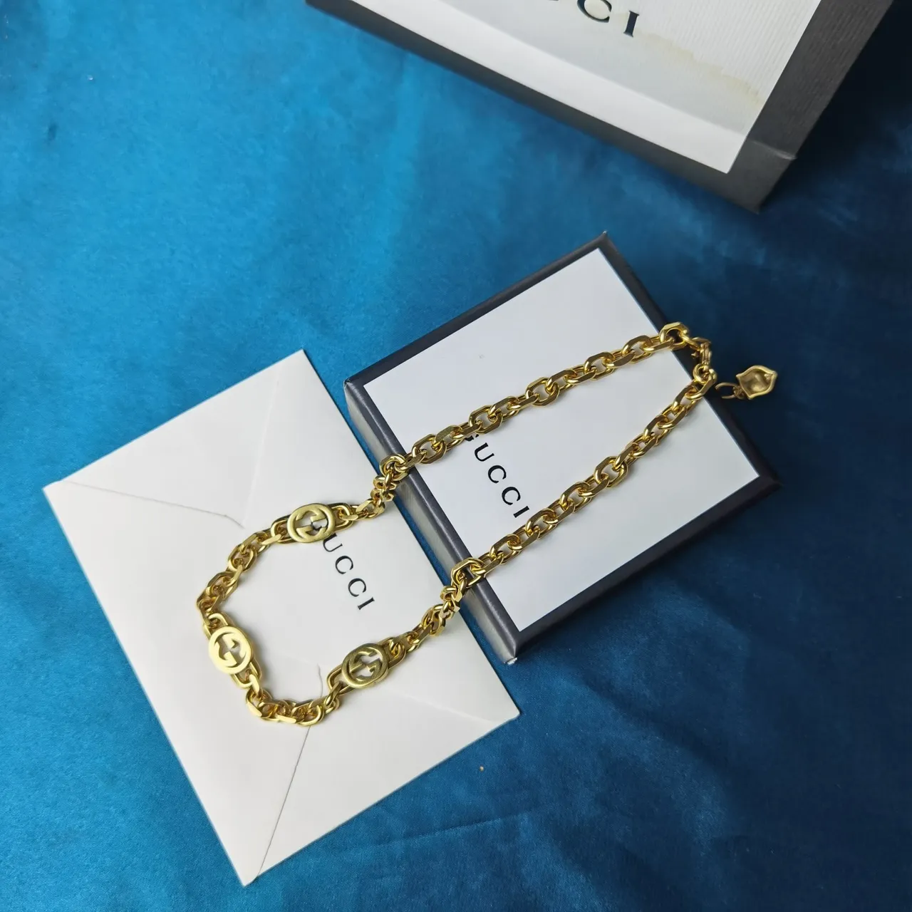 Gucci GG Marmont doré chaîne GG entrelacée 6