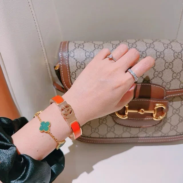Gucci GG Marmont سوار إيناميل برتقالي ذهبي اللون 8