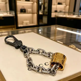 سوار Gucci GG Marmont سلسلة مزخرفة فضي ذهبي إغلاق زهور أسود