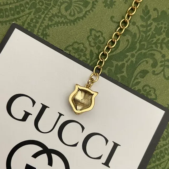 Collar Gucci Ophidia Oro y Plata con eslabones GG interconectados y motivos florales de margarita 2