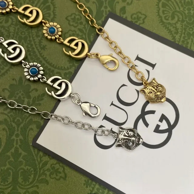 Collar Gucci Ophidia Oro y Plata con eslabones GG interconectados y motivos florales de margarita 4