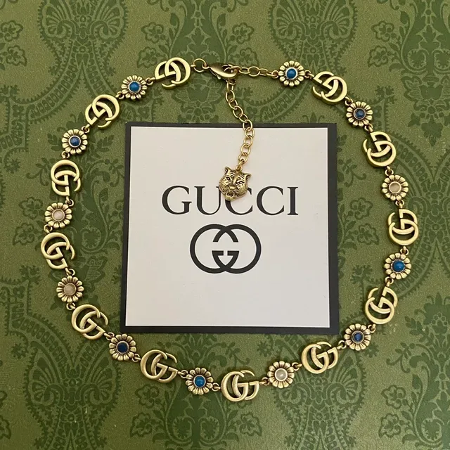 Collar Gucci Ophidia Oro y Plata con eslabones GG interconectados y motivos florales de margarita 6