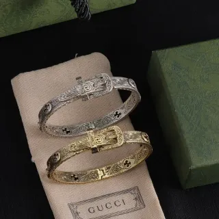 Gucci Pulseras de metal plateadas y doradas con broche engarzado grabado ornamentado