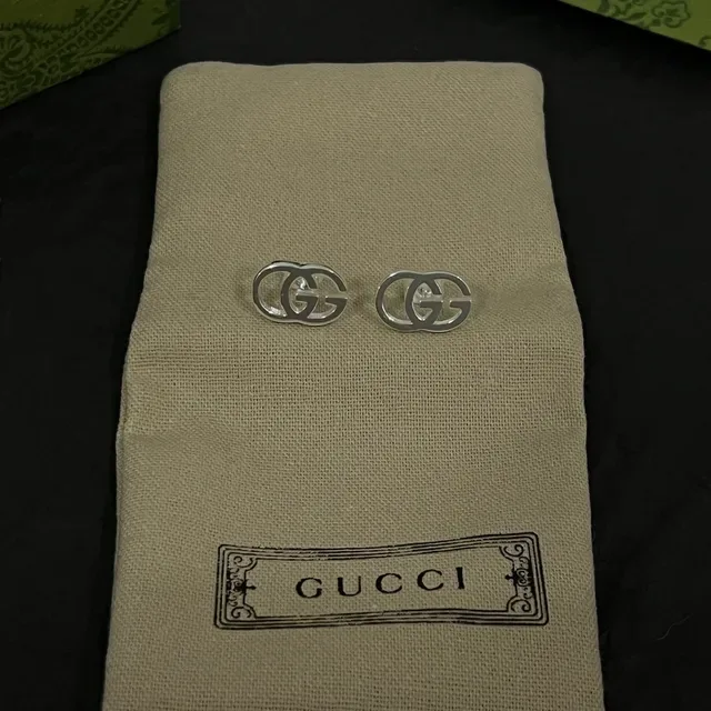 Gucci Silver Black Interlocking GG Logo Polished Metal Earrings 4
