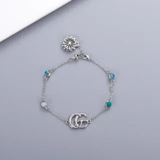 Gucci سوار سلسلة فضية زرقاء متشابكة شعار GG