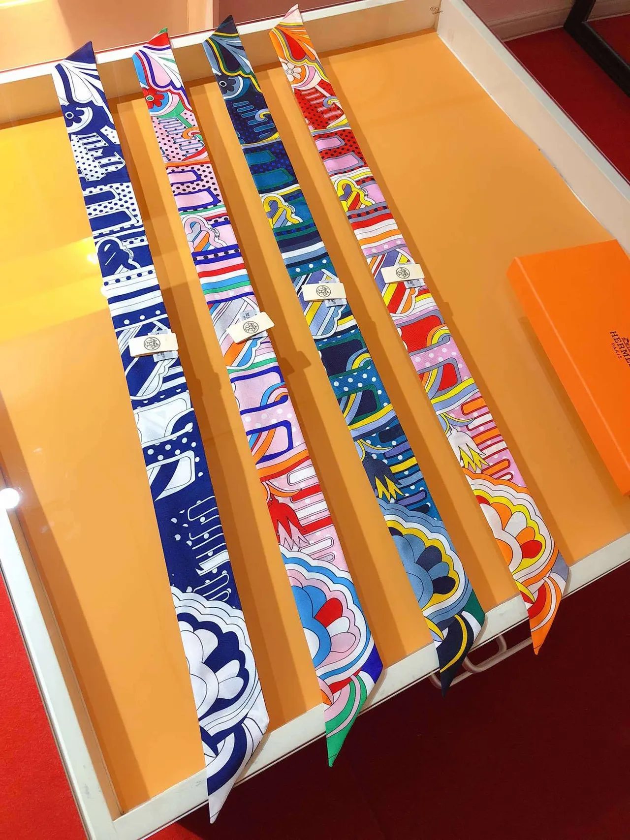 Hermès Twilly 'Rainbow of Fubao Avenue' Navy and White Silk Scarf 7