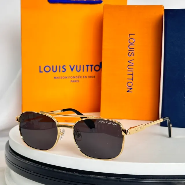 Louis Vuitton Lunettes de soleil à monture en métal noir dégradé marron 9