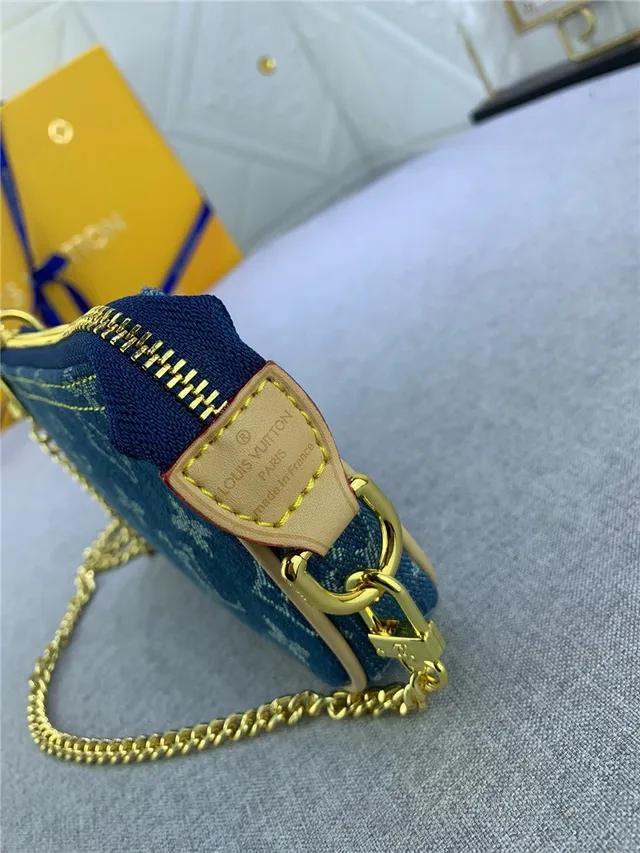 Louis Vuitton Bolso con correa de cadena Monogram de denim azul dorado 6