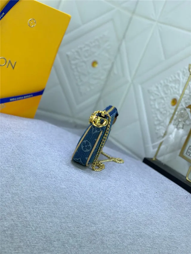 Louis Vuitton Bolso con correa de cadena Monogram de denim azul dorado 7