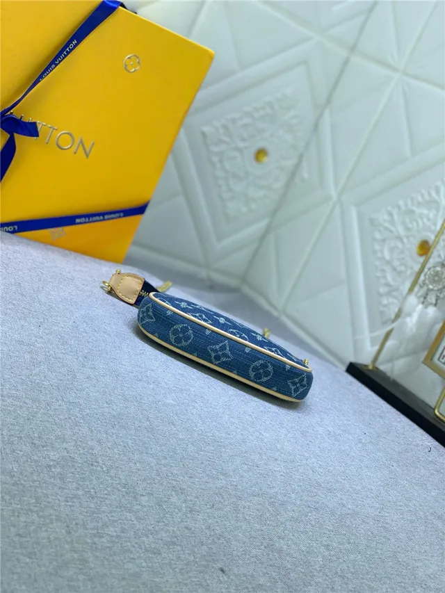 Louis Vuitton Bolso con correa de cadena Monogram de denim azul dorado 8