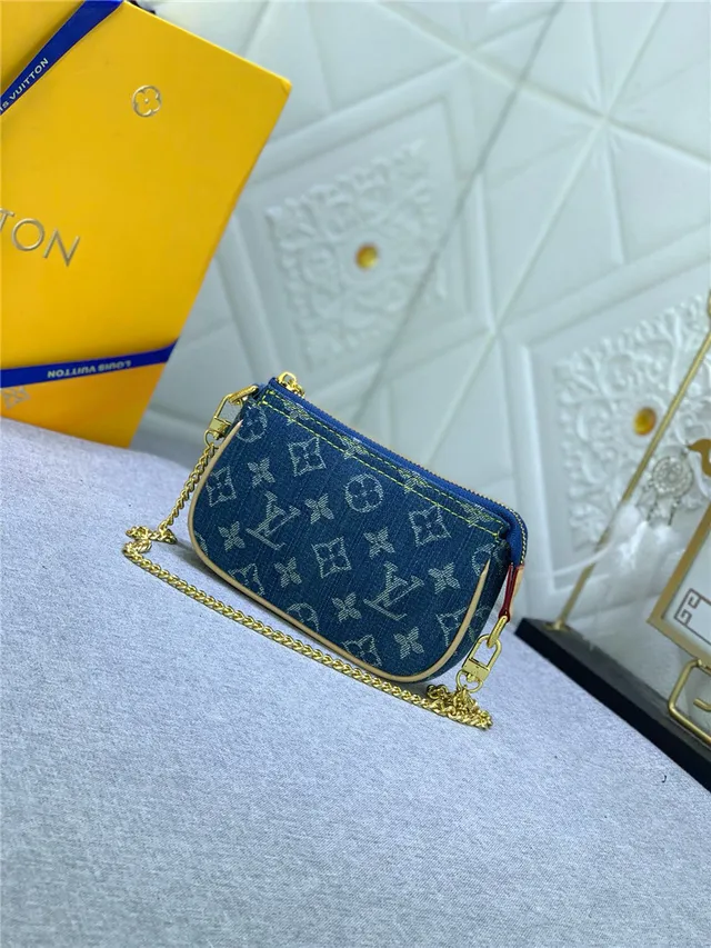 Louis Vuitton Bolso con correa de cadena Monogram de denim azul dorado 9