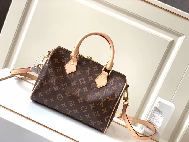 Louis Vuitton বাদামি বেইজ মোনোগ্রাম ক্যানভাস ট্যান চামড়া ট্রিম বোস্টন ব্যাগ 8