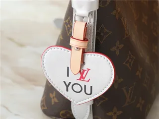 Louis Vuitton বাদামী সাদা মোনোগ্রাম ক্যানভাস চাঁদি টোন হার্ডওয়্যার বাকেট ব্যাগ 6
