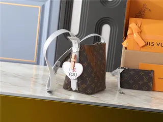 Louis Vuitton বাদামী সাদা মোনোগ্রাম ক্যানভাস চাঁদি টোন হার্ডওয়্যার বাকেট ব্যাগ 9
