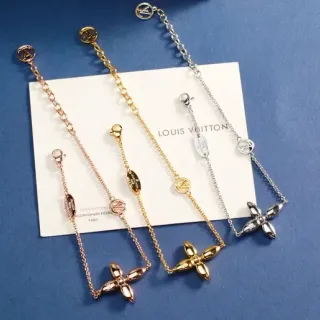 Pulsera colgante Louis Vuitton con motivo floral, cadena de eslabones en oro y plata, cuatro pétalos