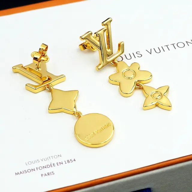 Boucles d'oreilles Louis Vuitton en métal doré asymétriques pendantes 2