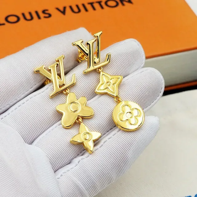 Boucles d'oreilles Louis Vuitton en métal doré asymétriques pendantes 6