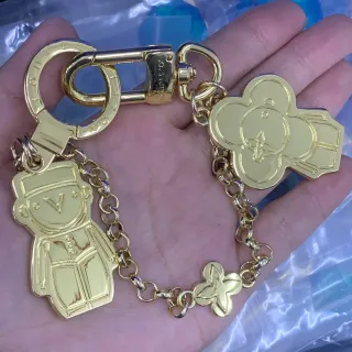Louis Vuitton Gold Metal Engraved Monogram Jewelry