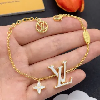 سوار لويس فيتون مونوغرام مجوهرات ذهبي أبيض مينا LV و زهرة تعويذة