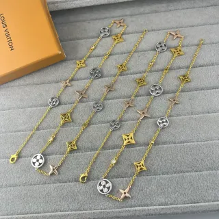 Louis Vuitton Multi-Charm Gold-Tone Floral and Star Bracelet