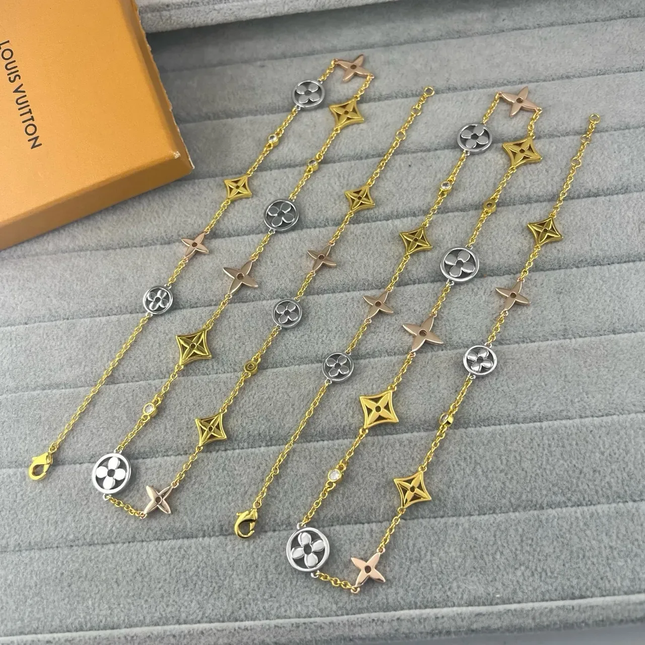 Louis Vuitton Multi-Charm Gold-Tone Floral and Star Bracelet 2
