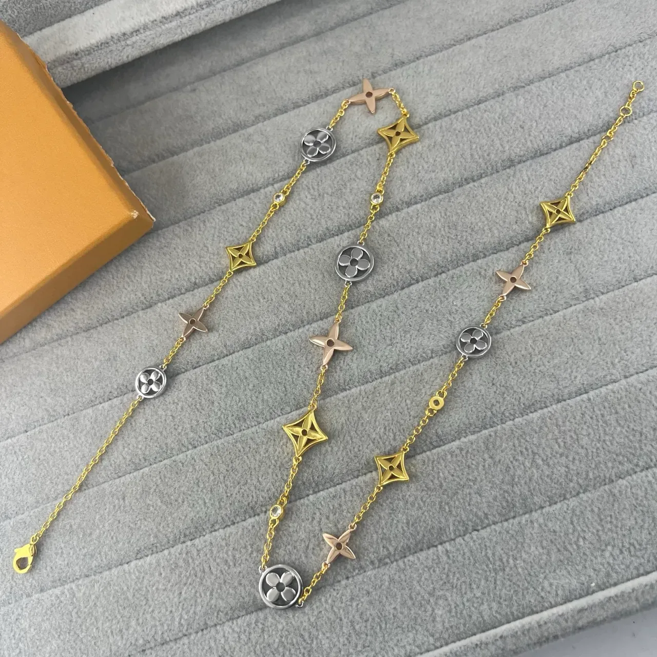 Louis Vuitton Multi-Charm Gold-Tone Floral and Star Bracelet 3