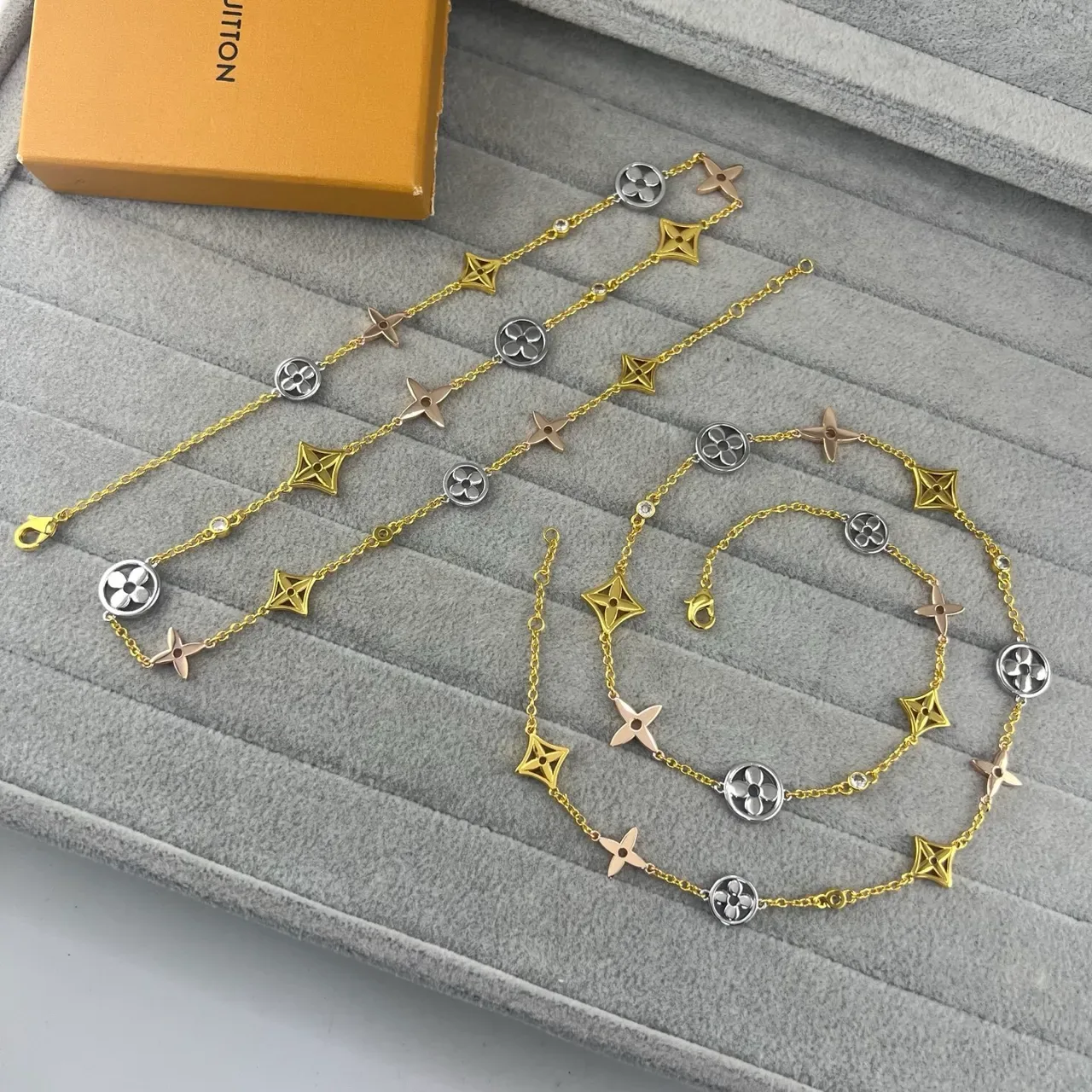 Louis Vuitton Multi-Charm Gold-Tone Floral and Star Bracelet 5