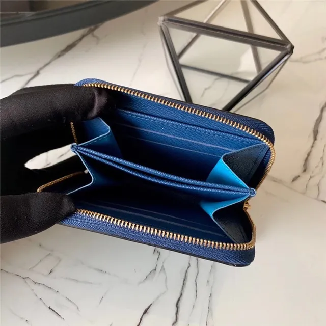 Cartera corta Louis Vuitton de cuero texturizado multicolor con cierre 11