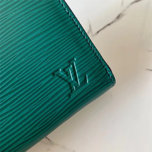 Cartera corta Louis Vuitton de cuero texturizado multicolor con cierre 14