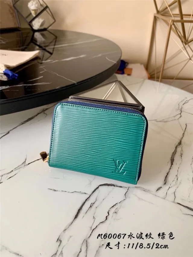 Cartera corta Louis Vuitton de cuero texturizado multicolor con cierre 17