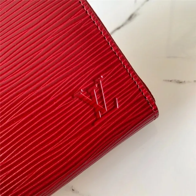 Cartera corta Louis Vuitton de cuero texturizado multicolor con cierre 22