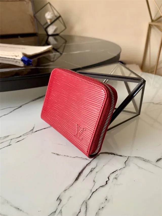 Cartera corta Louis Vuitton de cuero texturizado multicolor con cierre 24