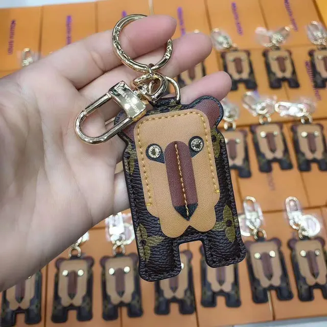 Louis Vuitton Ursinho de pelúcia Marrom Bege Silhueta Monograma Lona Encosto Capa para celular 5