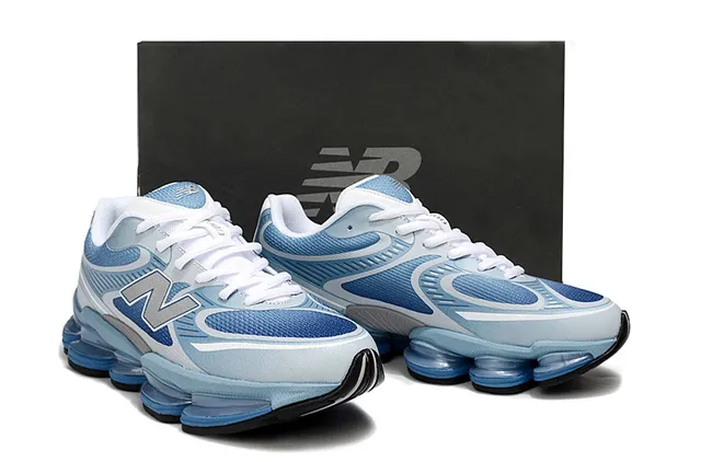 New Balance أزرق وأبيض Segmented Pod Midsole شبكي وطبقة اصطناعية علوية أحذية رياضية لايف ستايل 5
