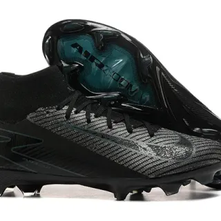 Nike Chaussures de football noir et bleu, col de chaussette à coupe haute, upper en tricot texturé, pour sol ferme