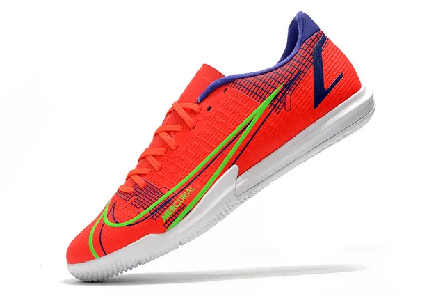 Nike Chaussures de football indoor bleu orange coupe basse upper synthétique overlay texturé grille 16