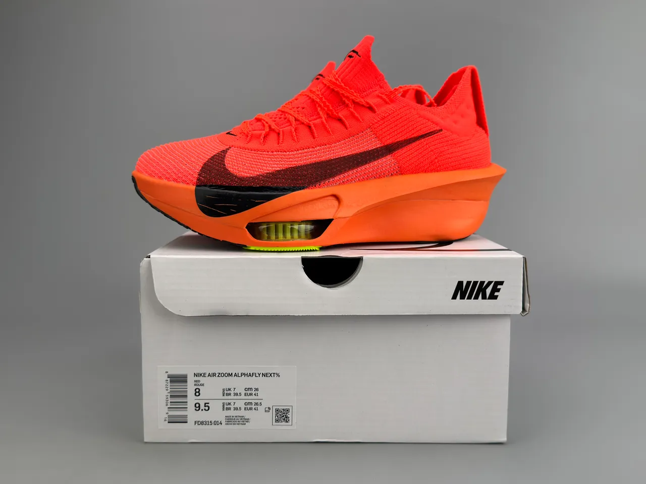 Nike Chaussures de running avec upper de knit orange noir, midsole sculpté 4