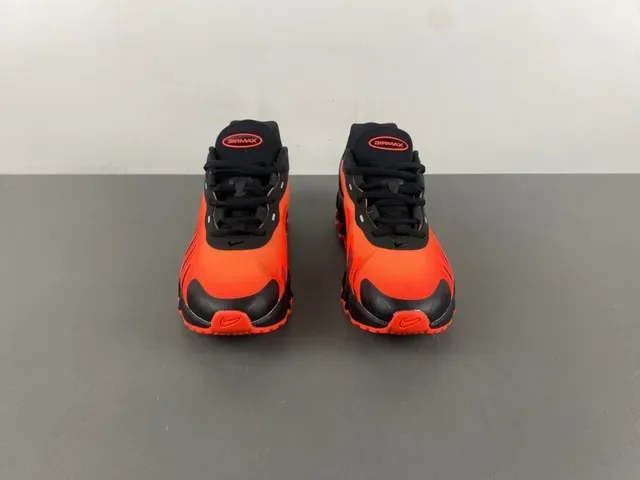 Nike Chaussure Performance Orange et Noir avec Semelle Intermédiaire Pod 11