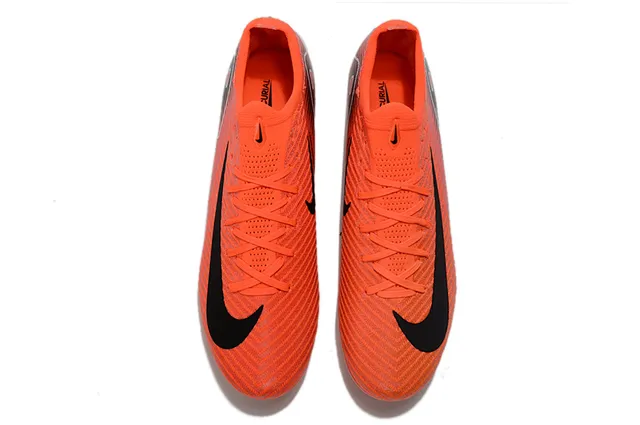 Nike Zapatillas de fútbol de corte bajo con empeine de punto sistema de cordones asimétrico para terreno firme color naranja rosa 2