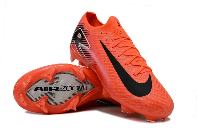 Nike Zapatillas de fútbol de corte bajo con empeine de punto sistema de cordones asimétrico para terreno firme color naranja rosa 3