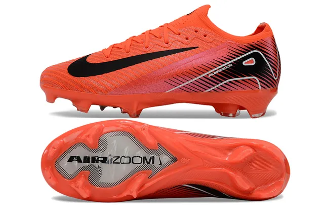 Nike Zapatillas de fútbol de corte bajo con empeine de punto sistema de cordones asimétrico para terreno firme color naranja rosa 5