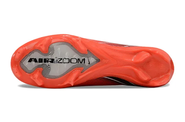 Nike Zapatillas de fútbol de corte bajo con empeine de punto sistema de cordones asimétrico para terreno firme color naranja rosa 6