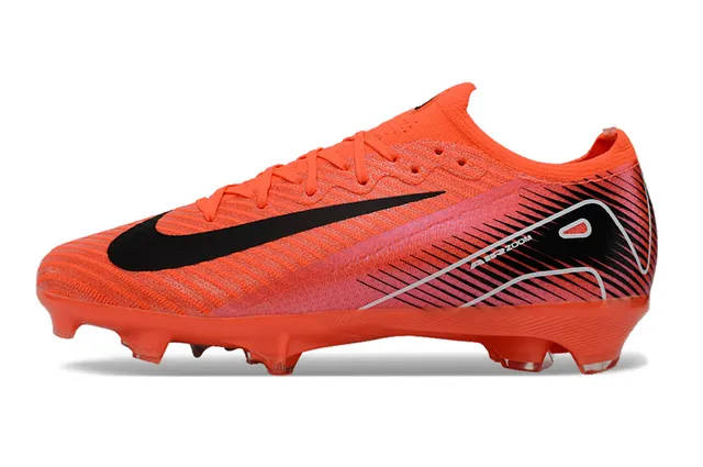 Nike Zapatillas de fútbol de corte bajo con empeine de punto sistema de cordones asimétrico para terreno firme color naranja rosa 8