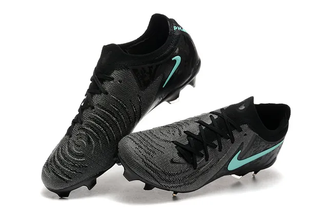 Nike Phantom GT Negro Azul Bajo Corte Confección de punto Sistema de cordones asimétrico Césped firme Zapatos de fútbol 3
