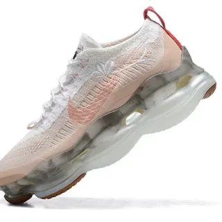 Nike chaussures de running avec upper blanc rose en maille, semelle intermédiaire translucide marbrée