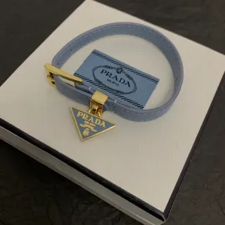 Prada Triangle Charm नीला गोल्ड पतली चमड़ी पट्टी बकल बंडल